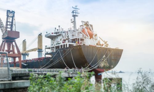 Cargo container ship at harbor.